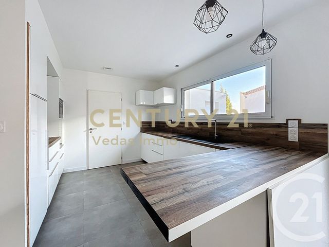 maison à louer - 4 pièces - 102.55 m2 - MONTBAZIN - 34 - LANGUEDOC-ROUSSILLON - Century 21 Védas Immo