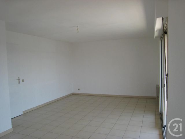 Afficher la photo en grand Appartement F3 à vendre - 3 pièces - 65.0 m2 - MAUGUIO CARNON - 34 - LANGUEDOC-ROUSSILLON - Century 21 Védas Immo